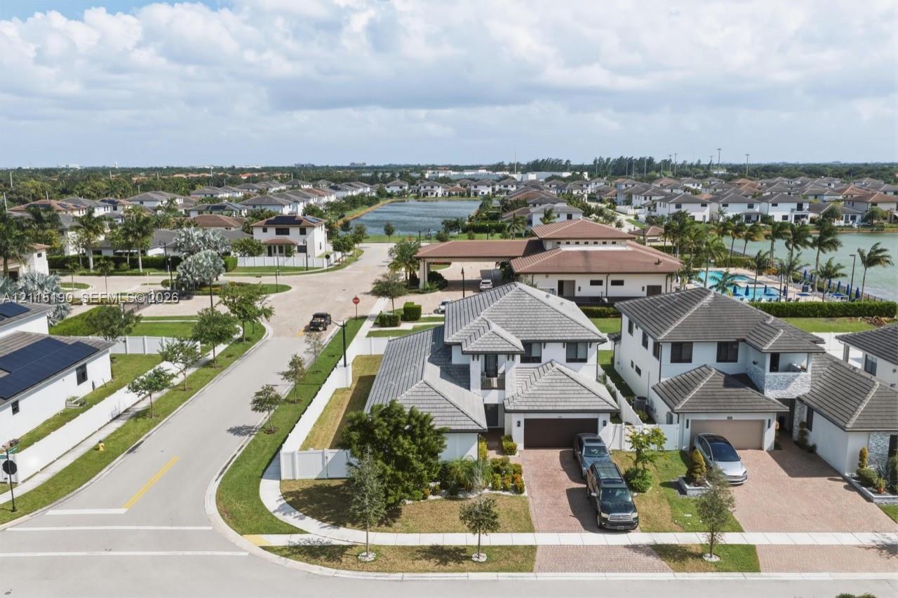 Front aerial view of the home and surrounding community.