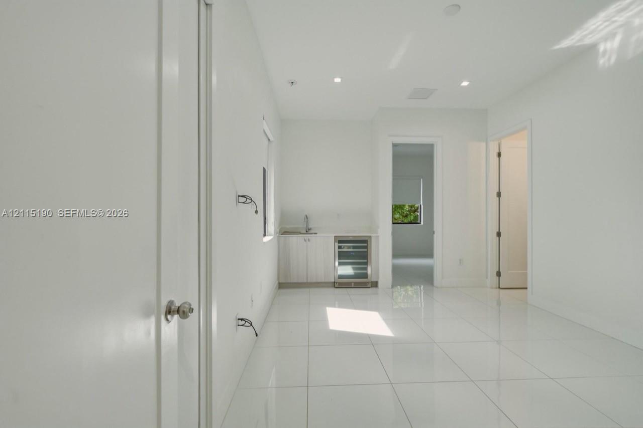 Additional interior area with wet bar.