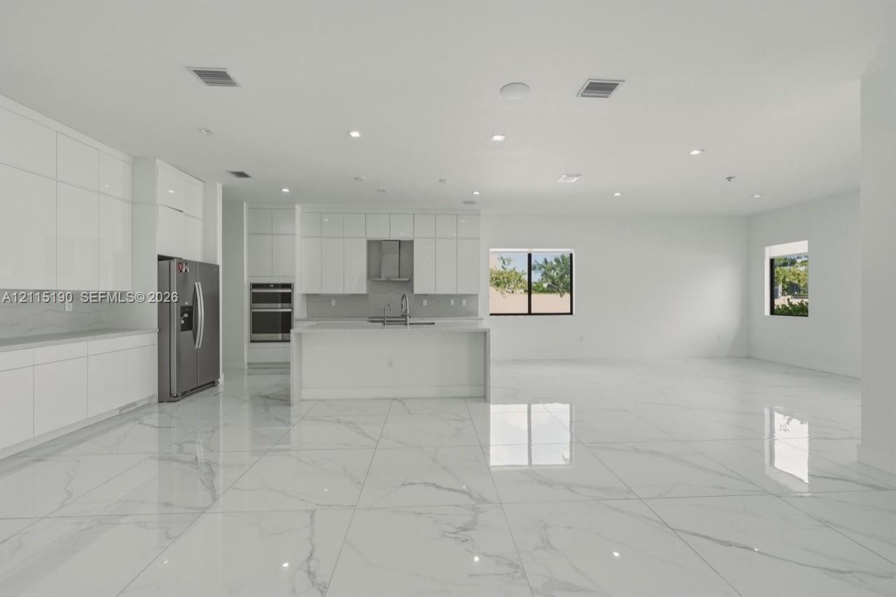 Kitchen and adjacent dining area.