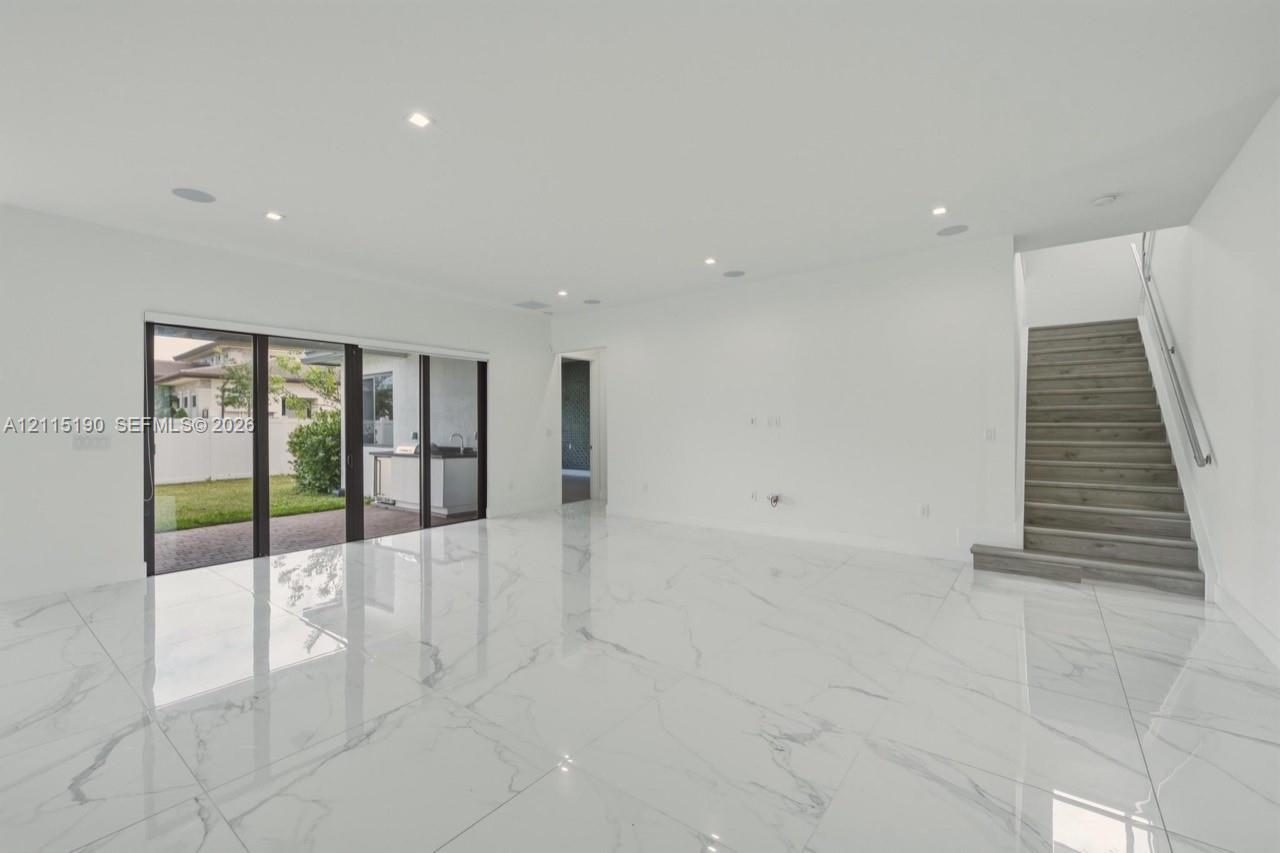 Main living area with sliding doors to the patio.