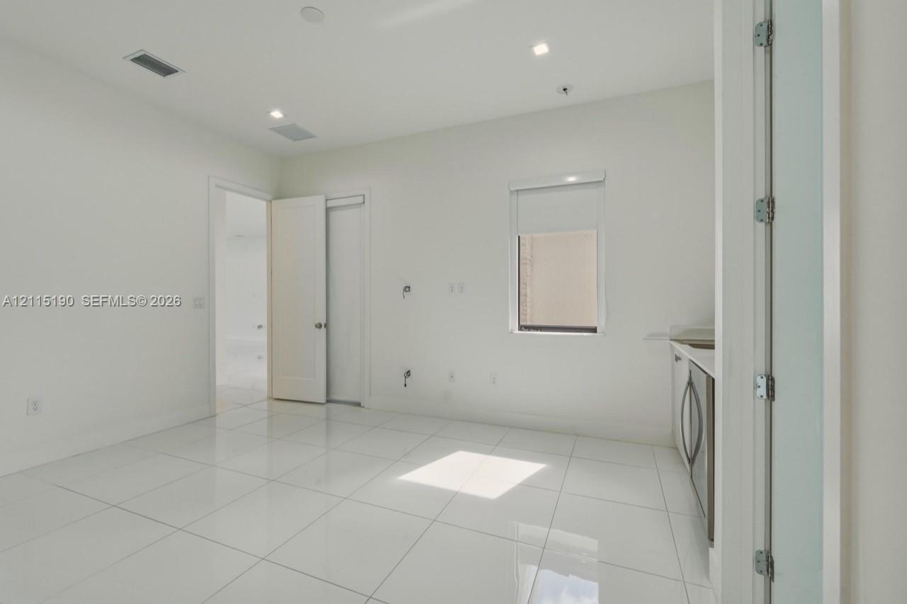 Additional living area with wet bar.