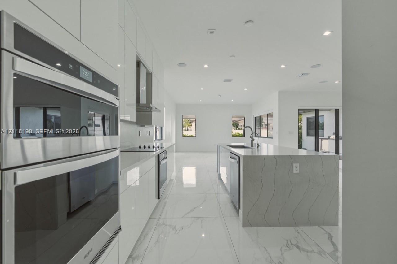 Kitchen appliances and island detail.