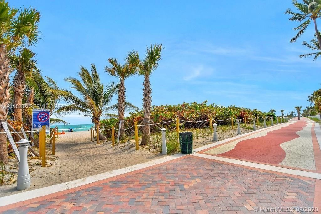 Beachfront boardwalk behind The Alexander building