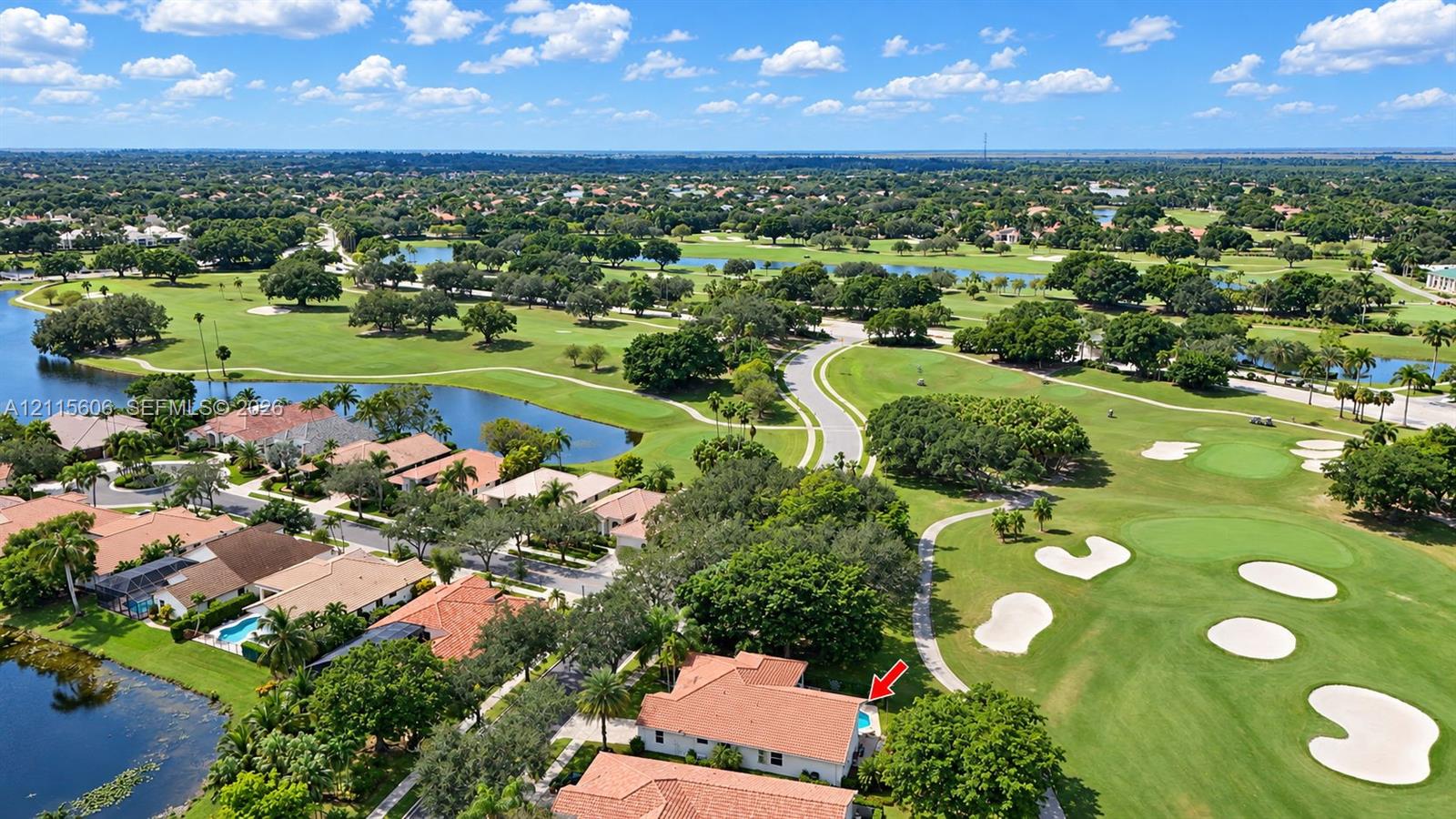 Aerial perspective featuring a tile roof, private swimming pool, and positioning along the golf course fairway