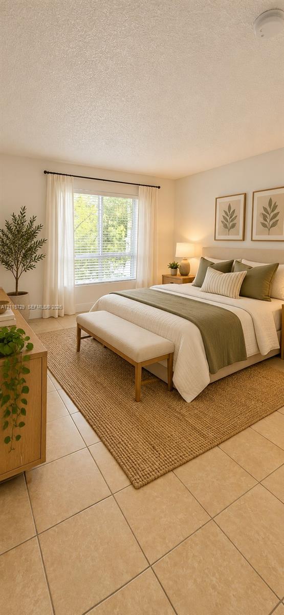 Neutral-toned tile flooring, large-format window with horizontal blinds, and smooth-finish ceiling