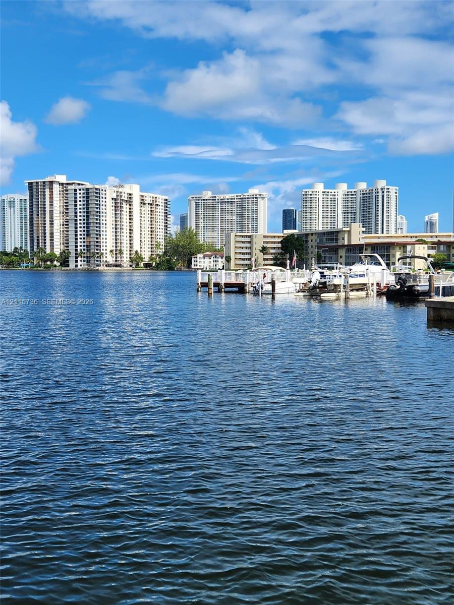 Waterfront property featuring a private boat dock and slip