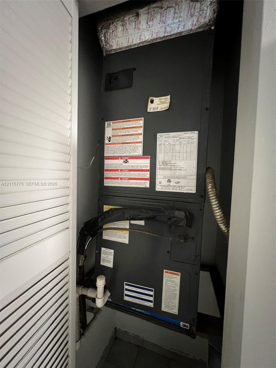Interior air handler unit enclosed in a louvered closet