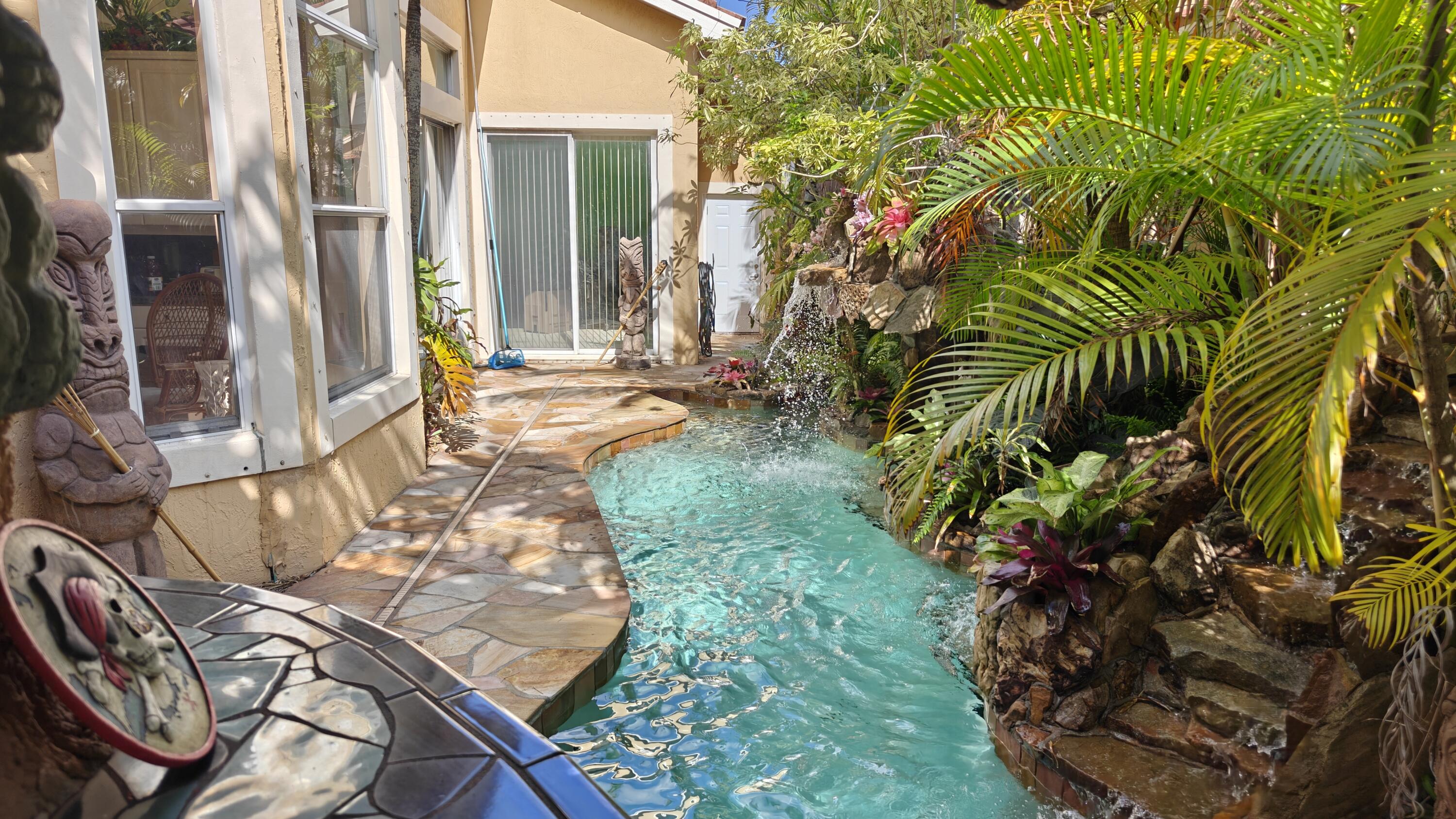 Pool view from patio tiki bar Pool view from patio tiki bar