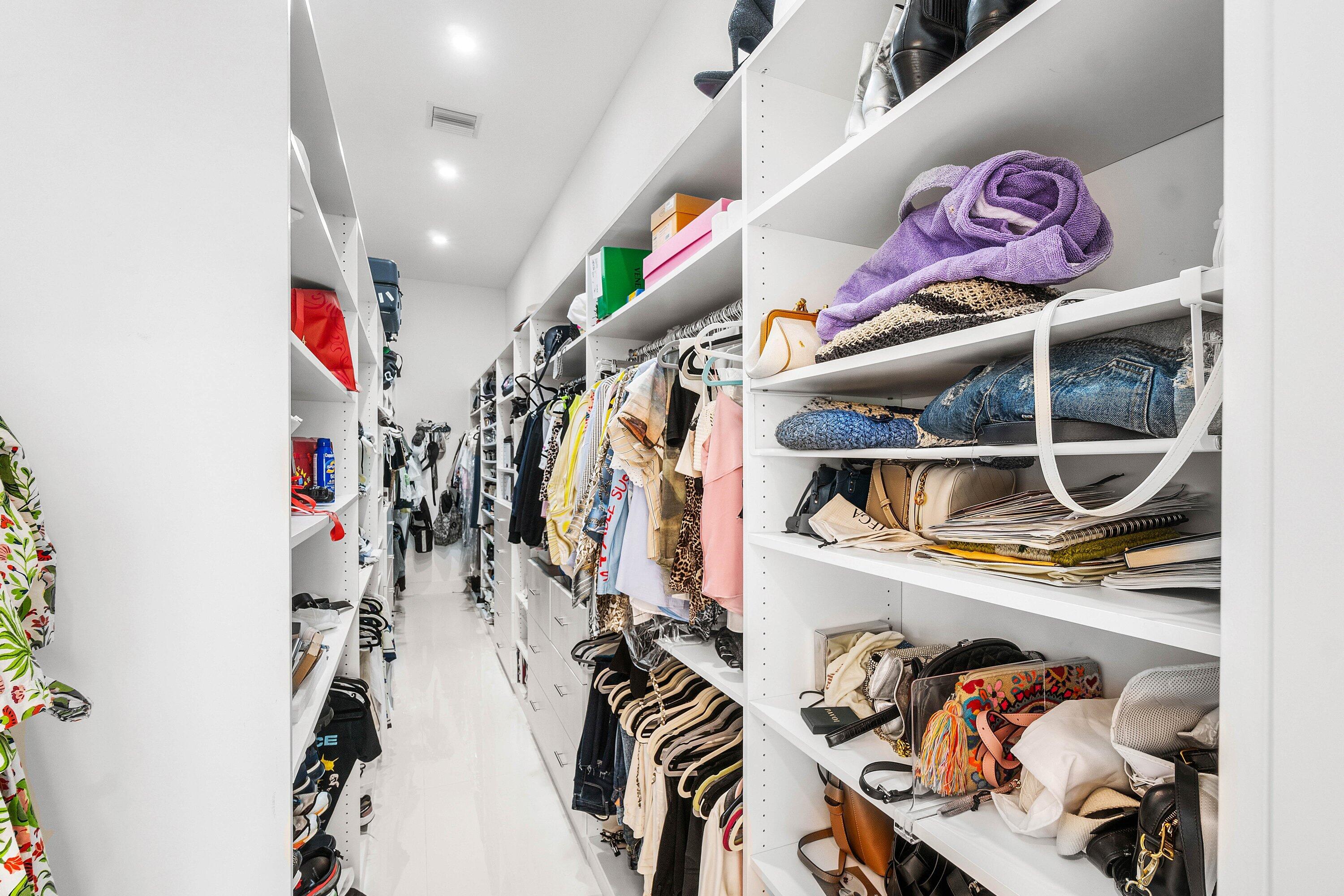 Primary Bedroom walk in closet