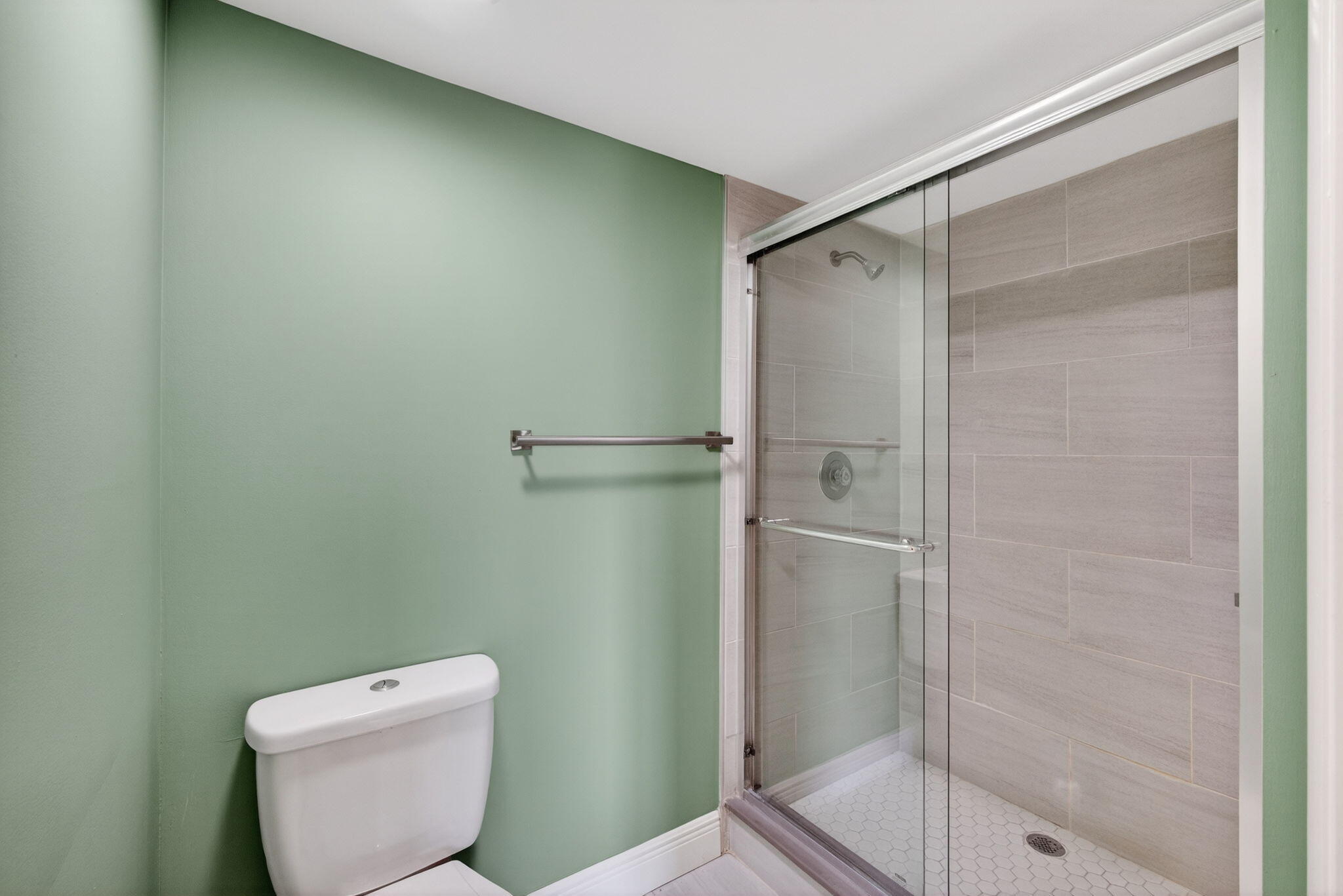 Remodeled floor, shower and surround
