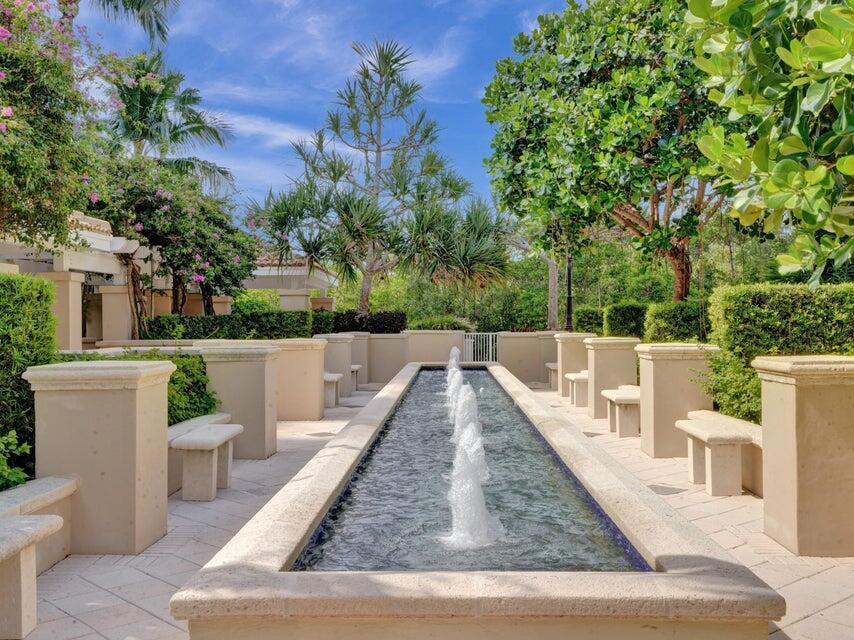 LUSHLY LANDSCAPED GROUNDS WITH FOUNTAINS