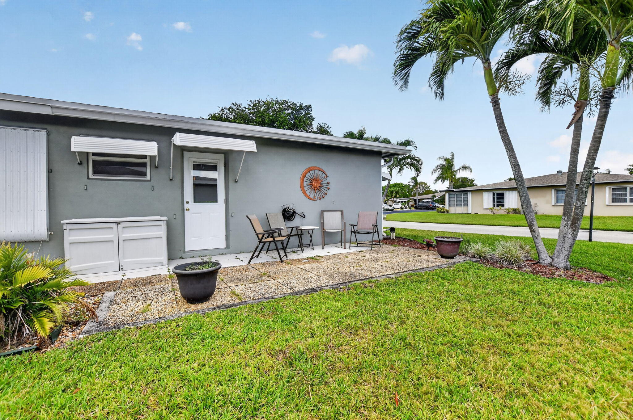 Inviting patio perfect for morning coffee, evening relaxation & peaceful green space views....