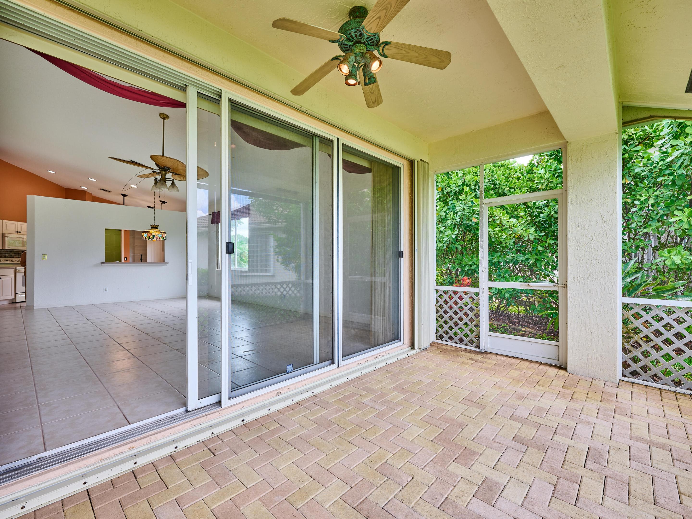 Sliders from great room to paved patio