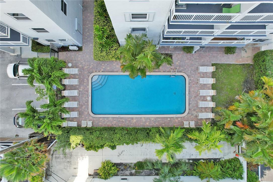Community Pool in Tropical Setting of Leisure Sands