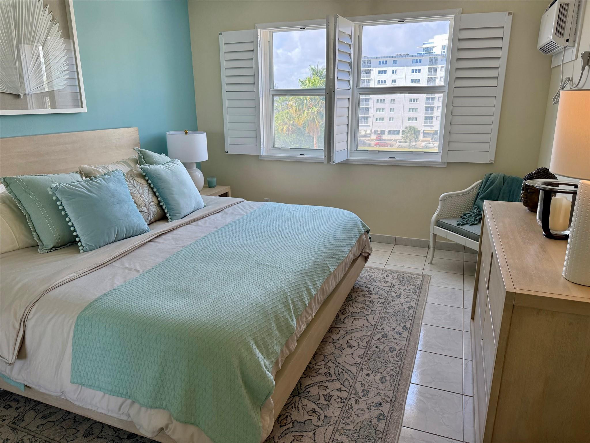 The king-size Pottery Barn bed and matching nightstands may remain with the condo rental or can be removed upon request.