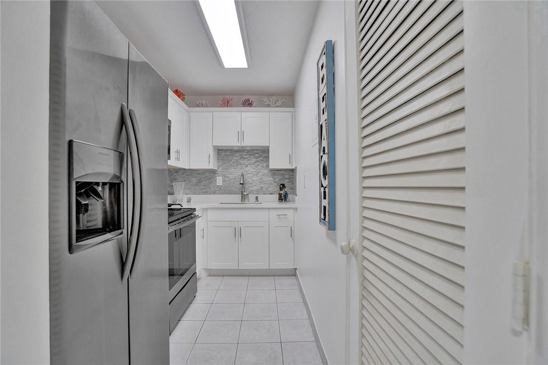 Beautifully Updated kitchen with full size Closet Pantry.
