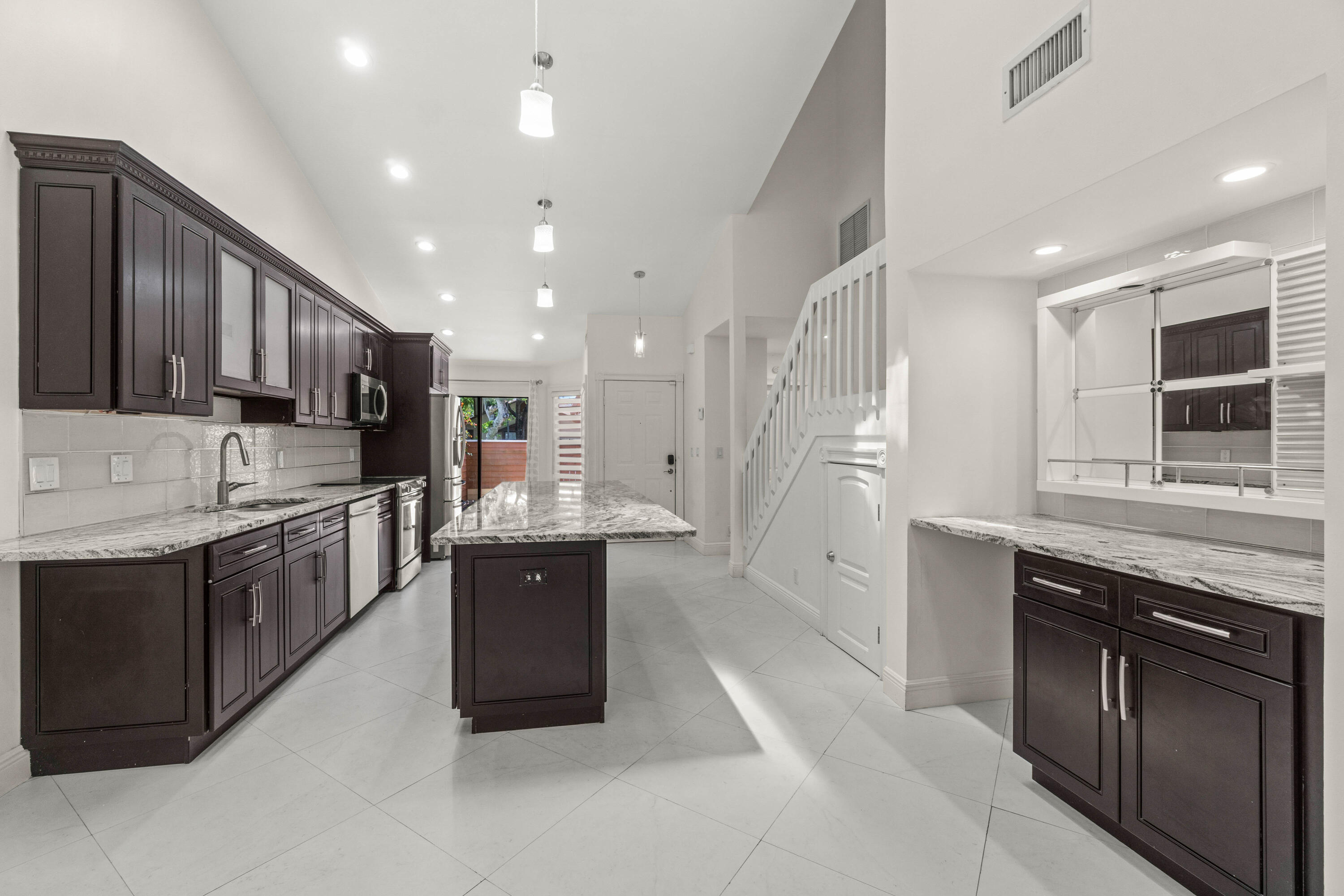 Spacious Kitchen Island ~ Plenty of space to have guests join you while sipping beverages.