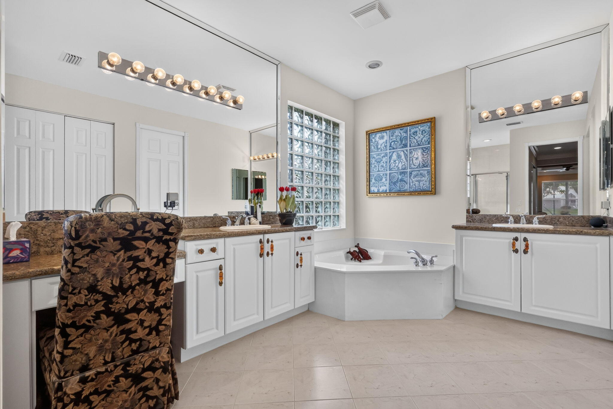 Dual Sinks, relaxing soaking tub and generous walk-in shower