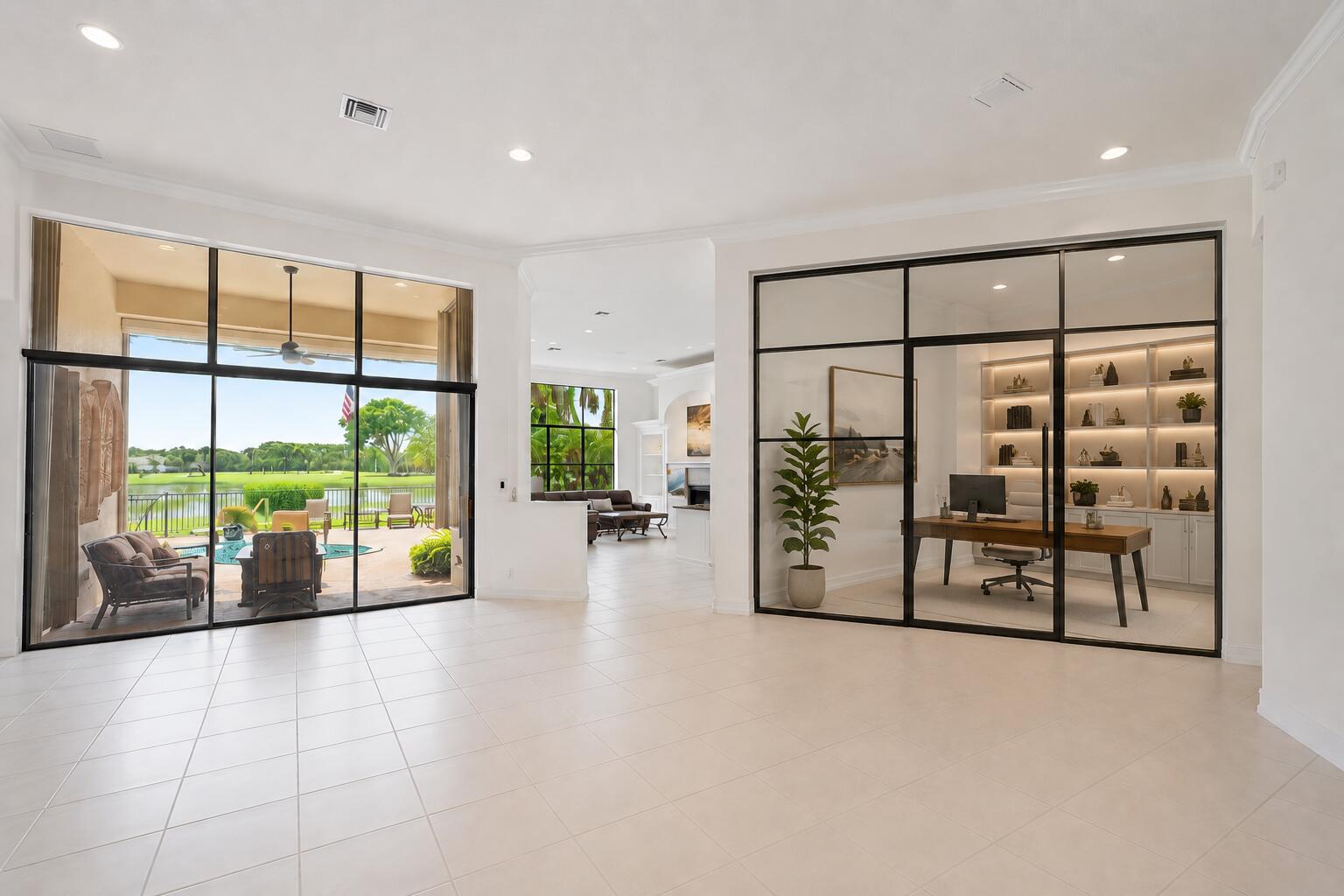 This is a rendering demonstrating how renovations, including adding glass walls and a doorway, could transform the dining room into a den or office.