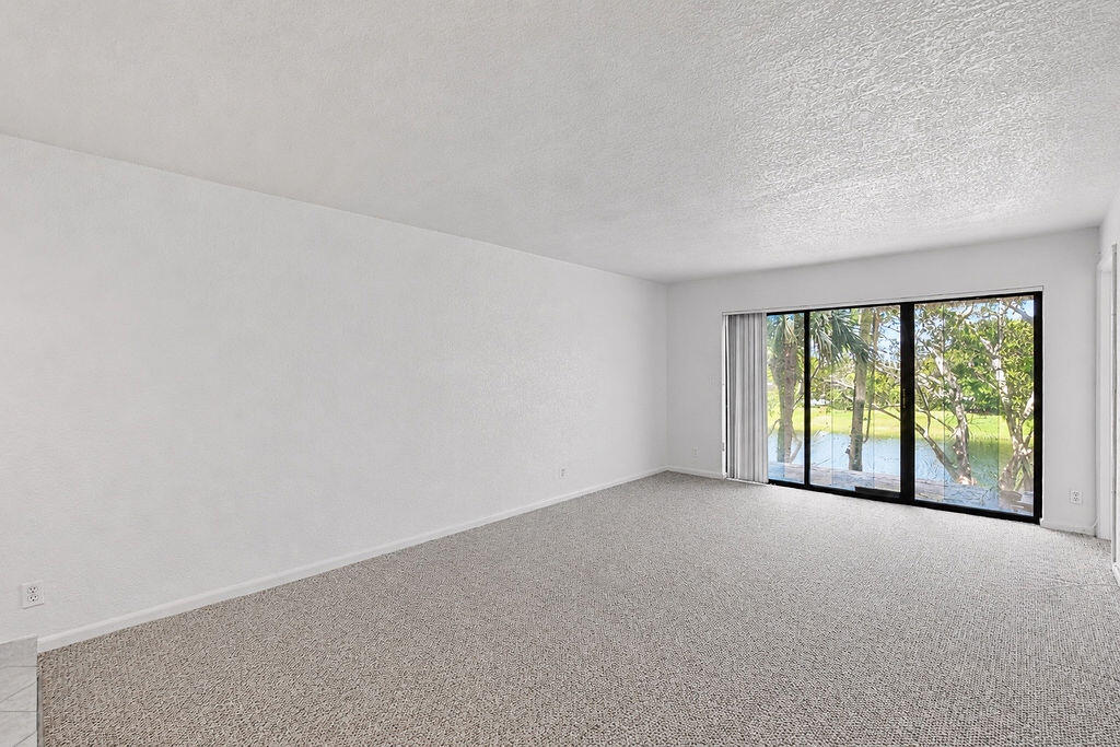 Living area & balcony with lake view