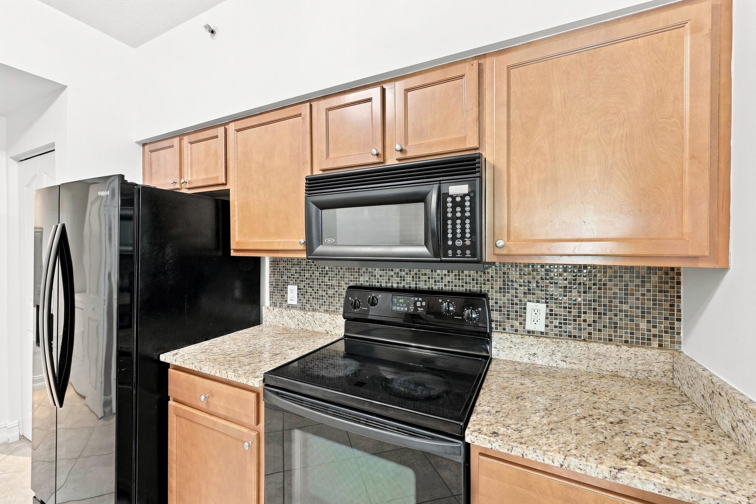 Side by Side Refrigerator/ Granite Counter tops
