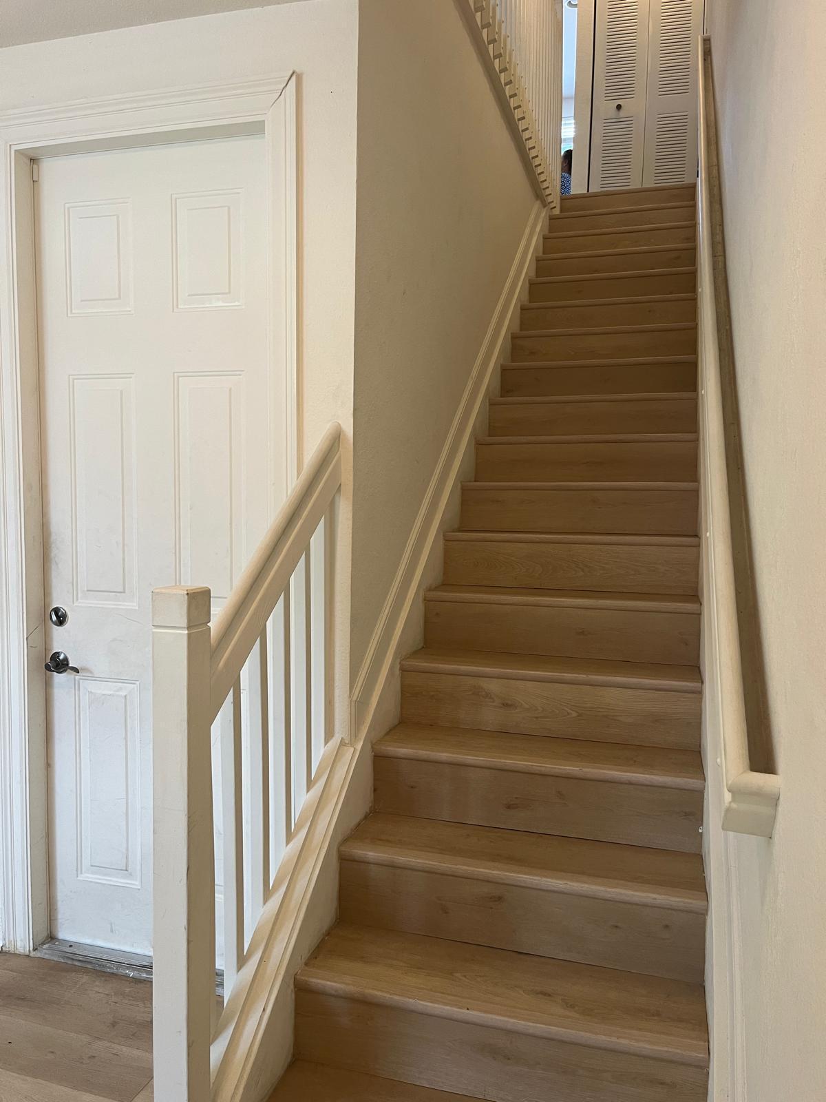 Stairs leading to 2nd floor from entry
