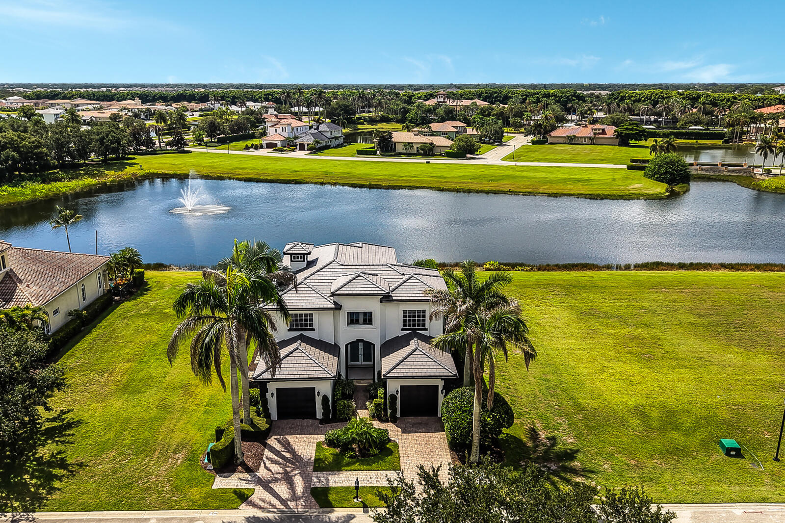 Expansive two-story residence with a multi-gabled tile roof