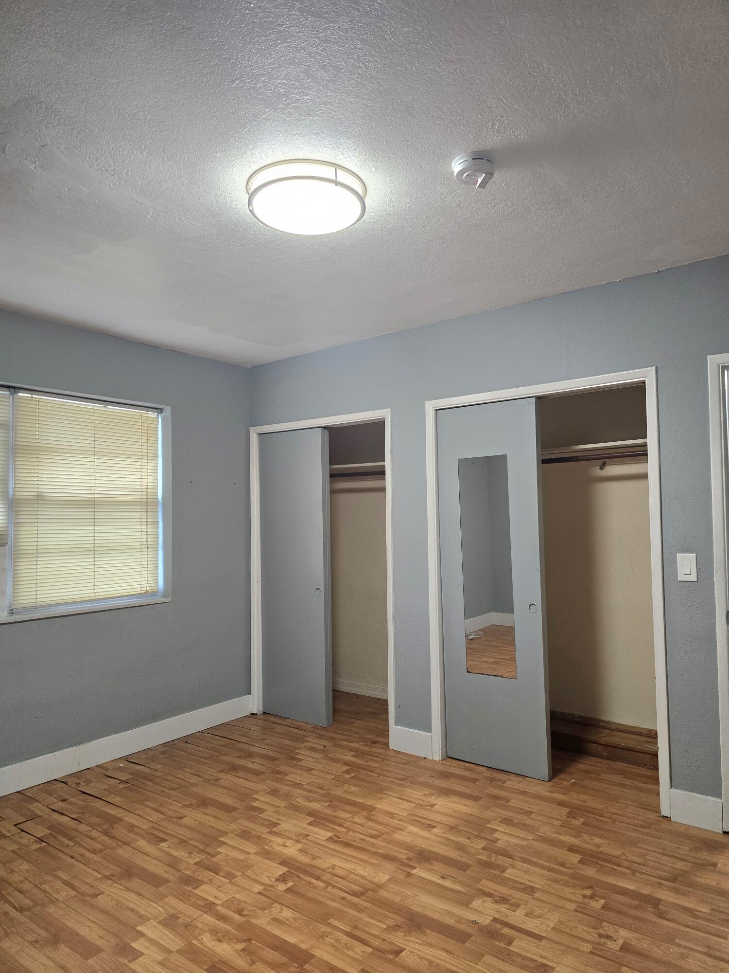 BEDROOM WITH CLOSETS