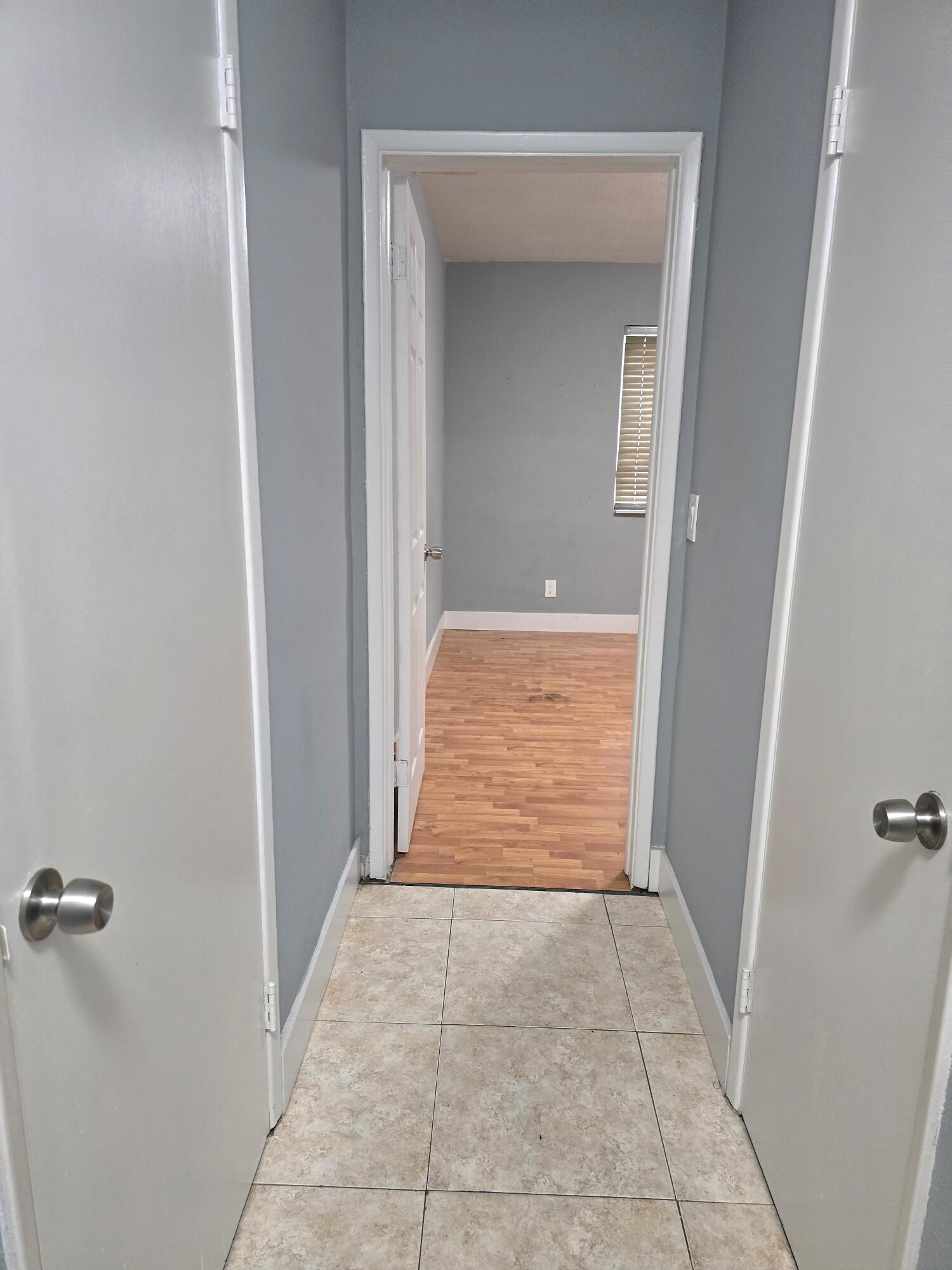 HALL LEADING TO BEDROOM