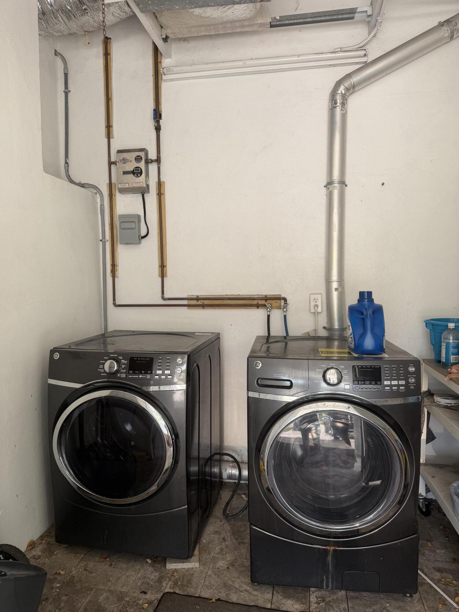 Washer and Dryer in Carport area