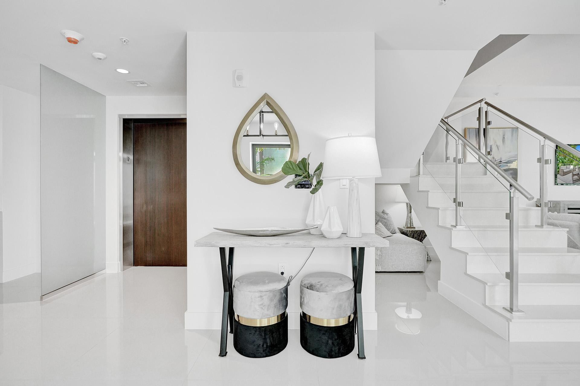 Bright hallway with polished white flooring