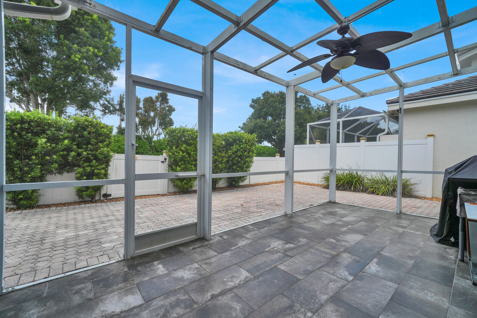 SCREENED IN PATIO OFF PRIMARY BEDROOM