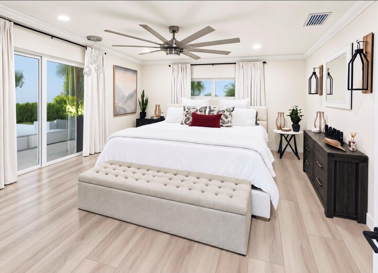 This spacious primary bedroom, with a walk in California closet offers a bright, serene retreat with Neutral finishes, warm wood flooring