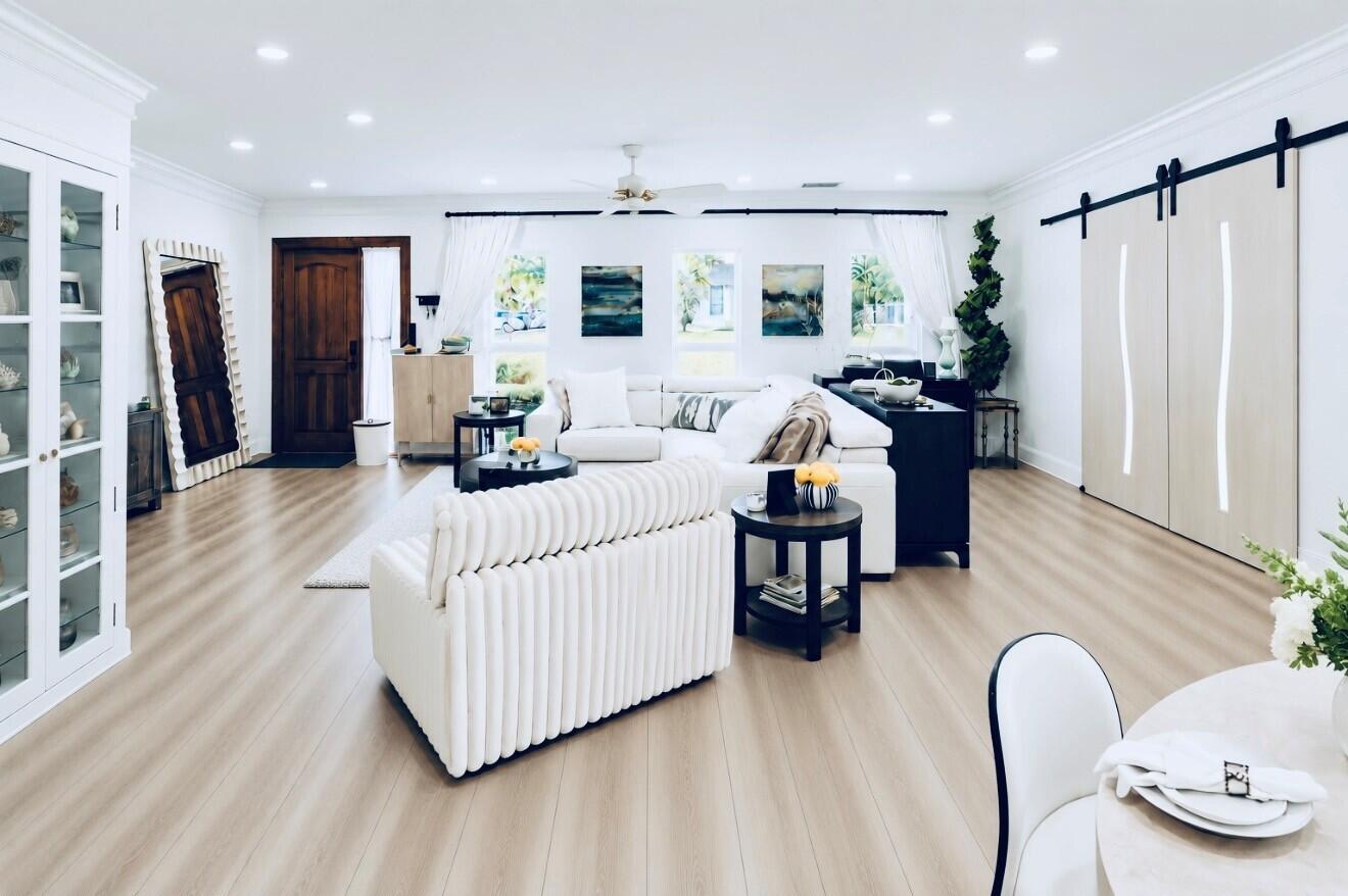 Modern, comfort, natural light, and style make this living room space feel like home