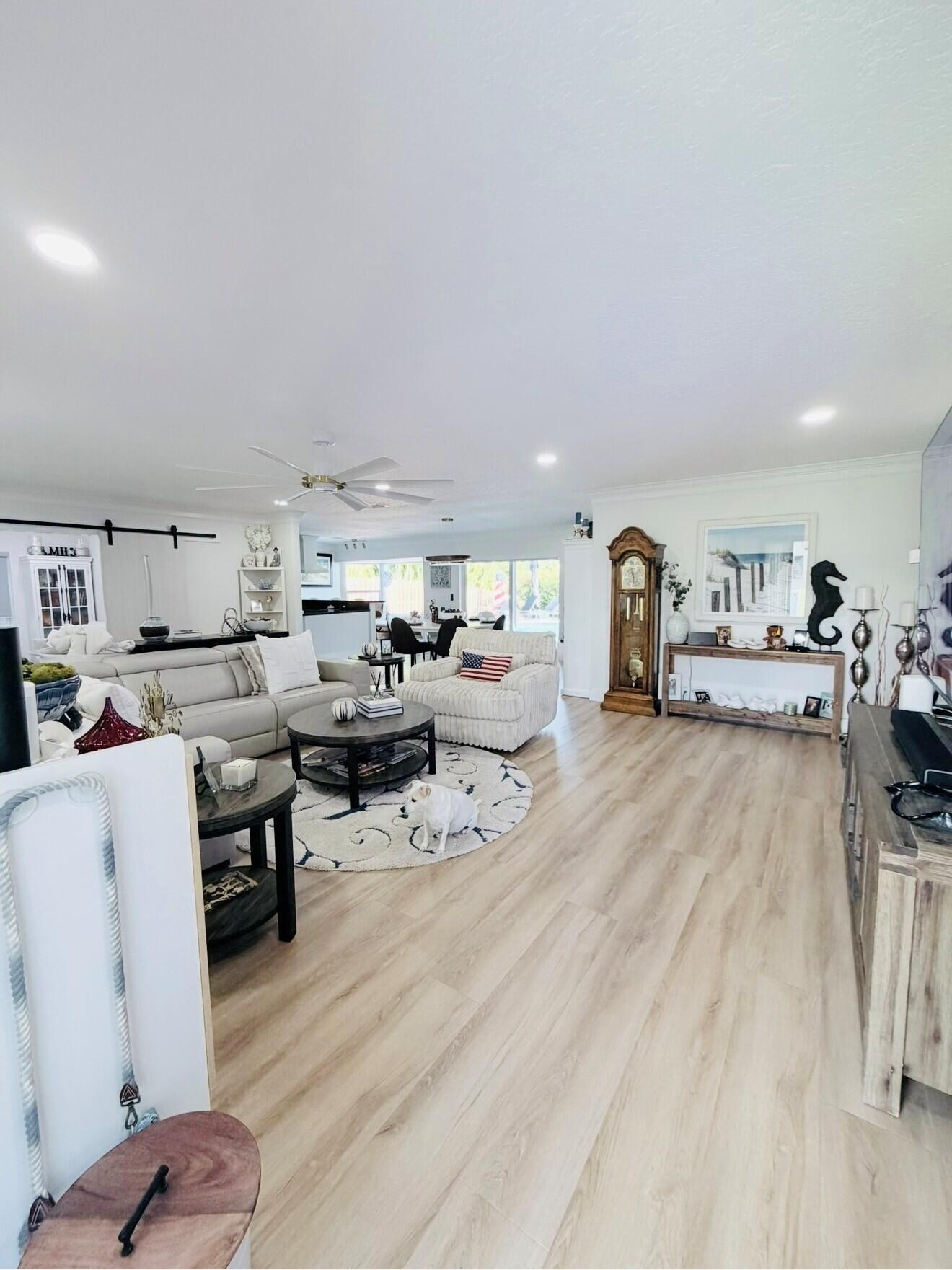 Bright, open, and beautifully designed, spacious living room area is perfect for relaxing and entertaining.