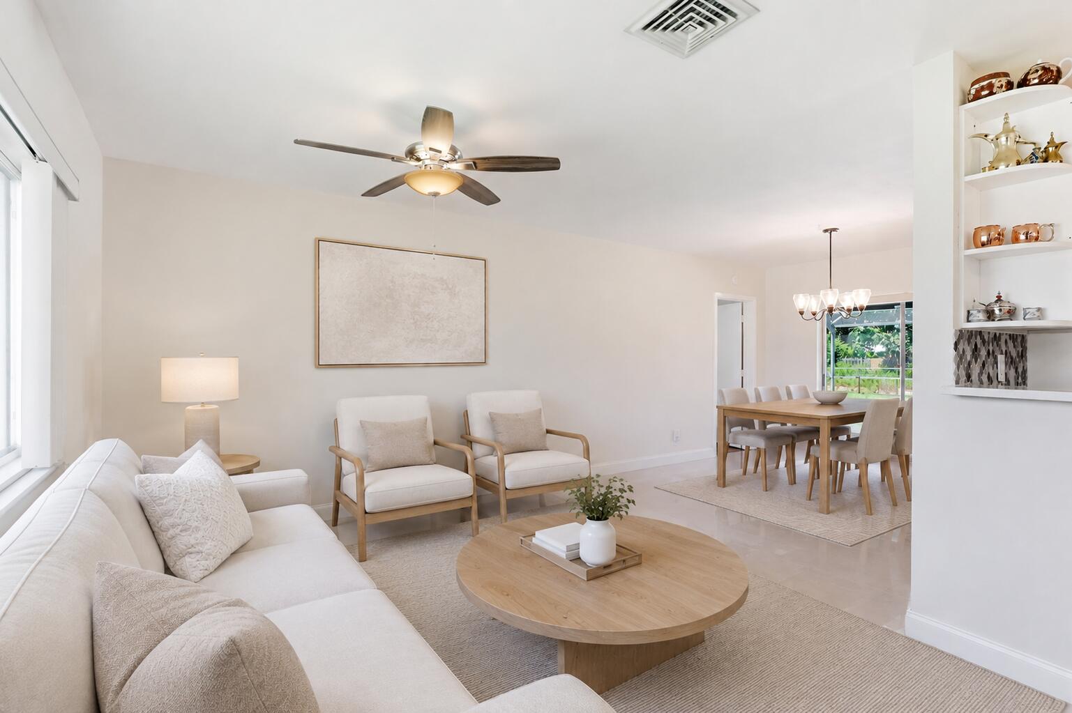 Living/Dining Room. (virtually staged for illustrative purposes; no permanent features or finishes have been altered) Living/Dining Room. (virtually staged for illustrative purposes; no permanent features or finishes have been altered)