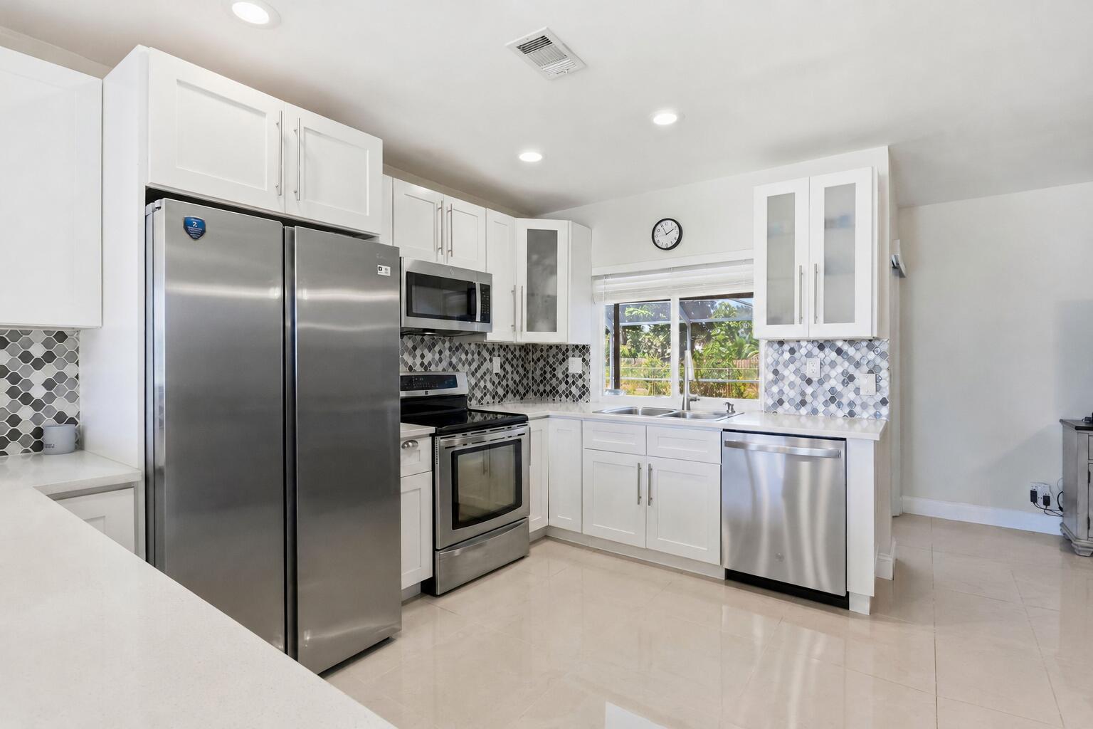 Kitchen with updated appliances. Kitchen with updated appliances.