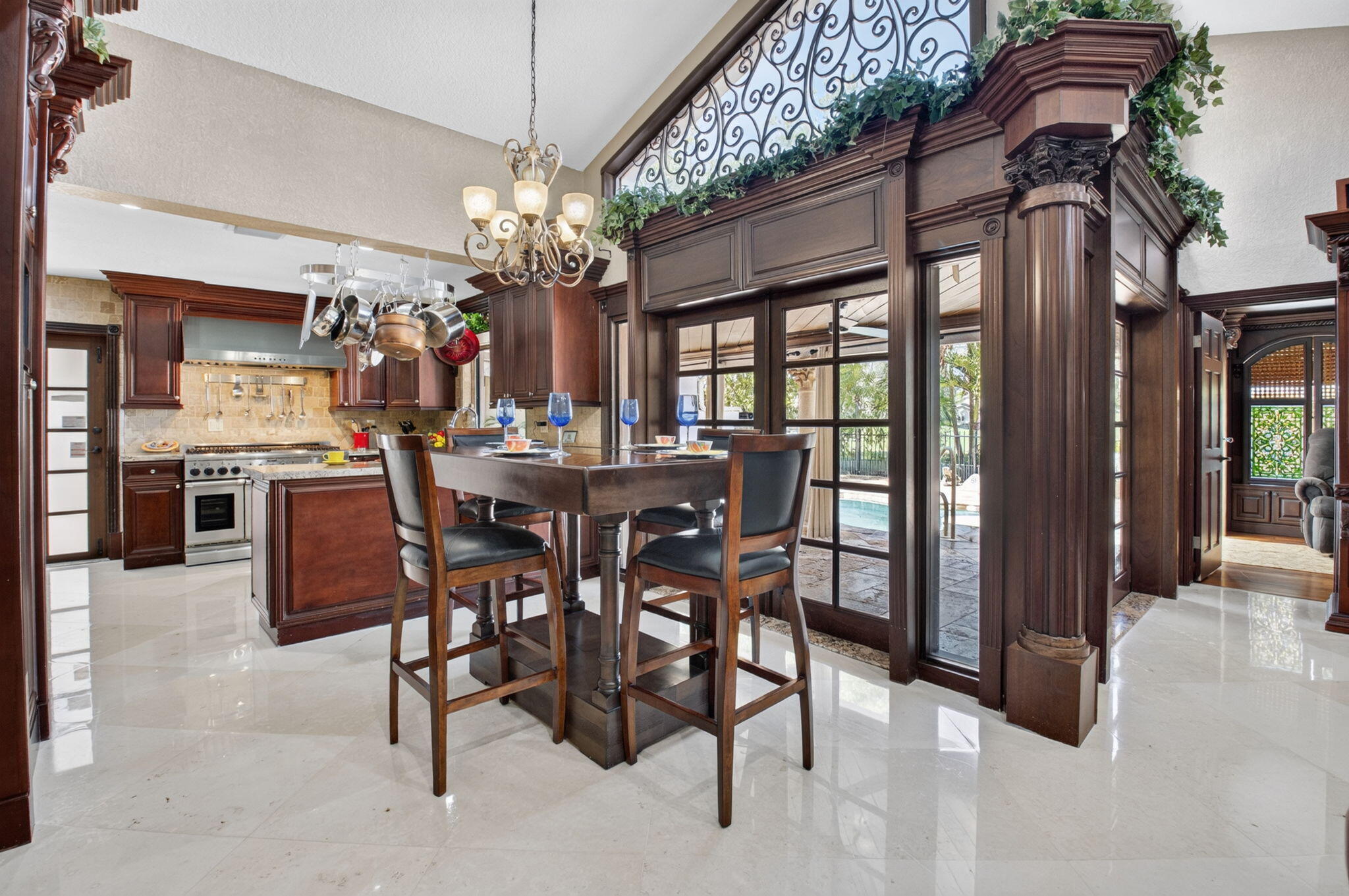 Dining area opens with French doors leading to amazing OUTDOOR OASIS! Dining area opens with French doors leading to amazing OUTDOOR OASIS!