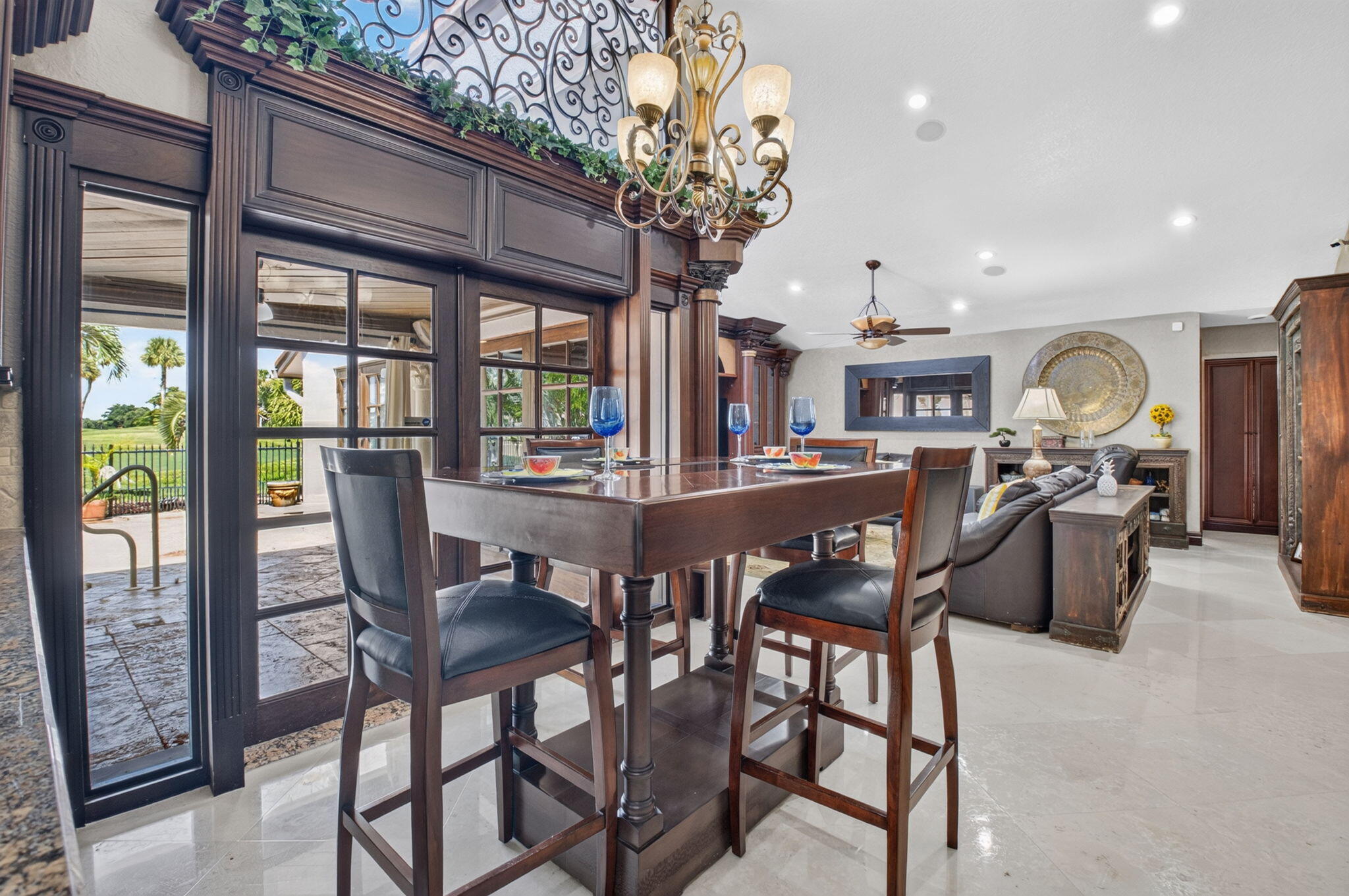 Entertaining is a breeze in your spacious living area overlooking the heated salt water pool. Entertaining is a breeze in your spacious living area overlooking the heated salt water pool.