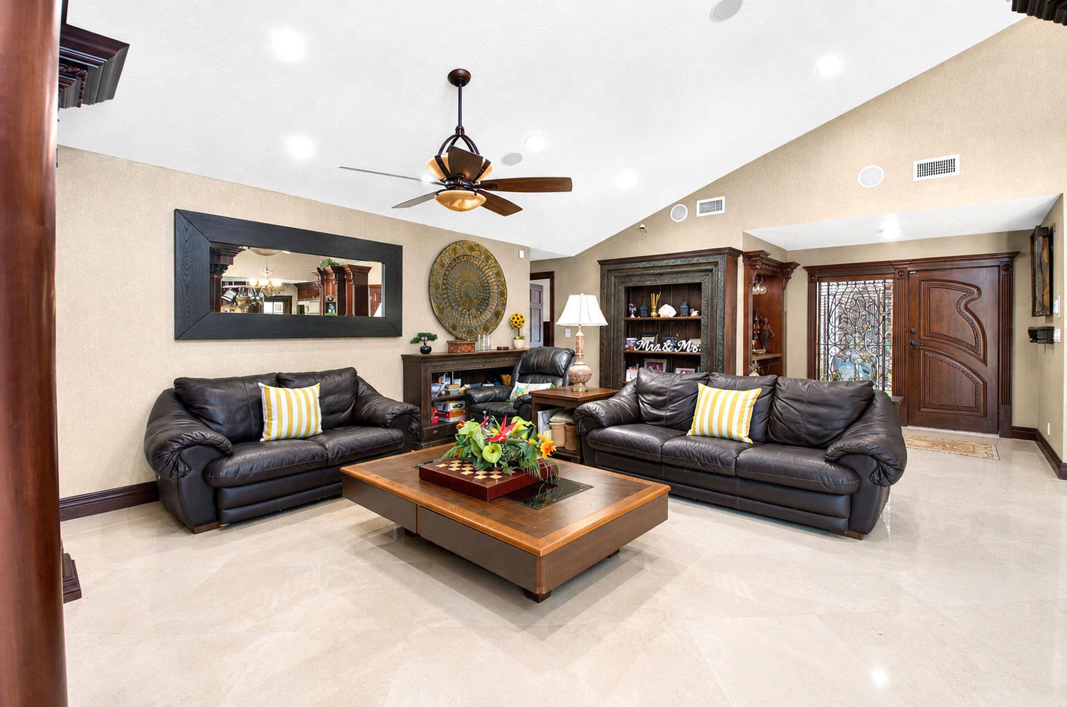 Expansive living areas with soaring ceilings and gorgeous porcelain flooring in living areas. Expansive living areas with soaring ceilings and gorgeous porcelain flooring in living areas.