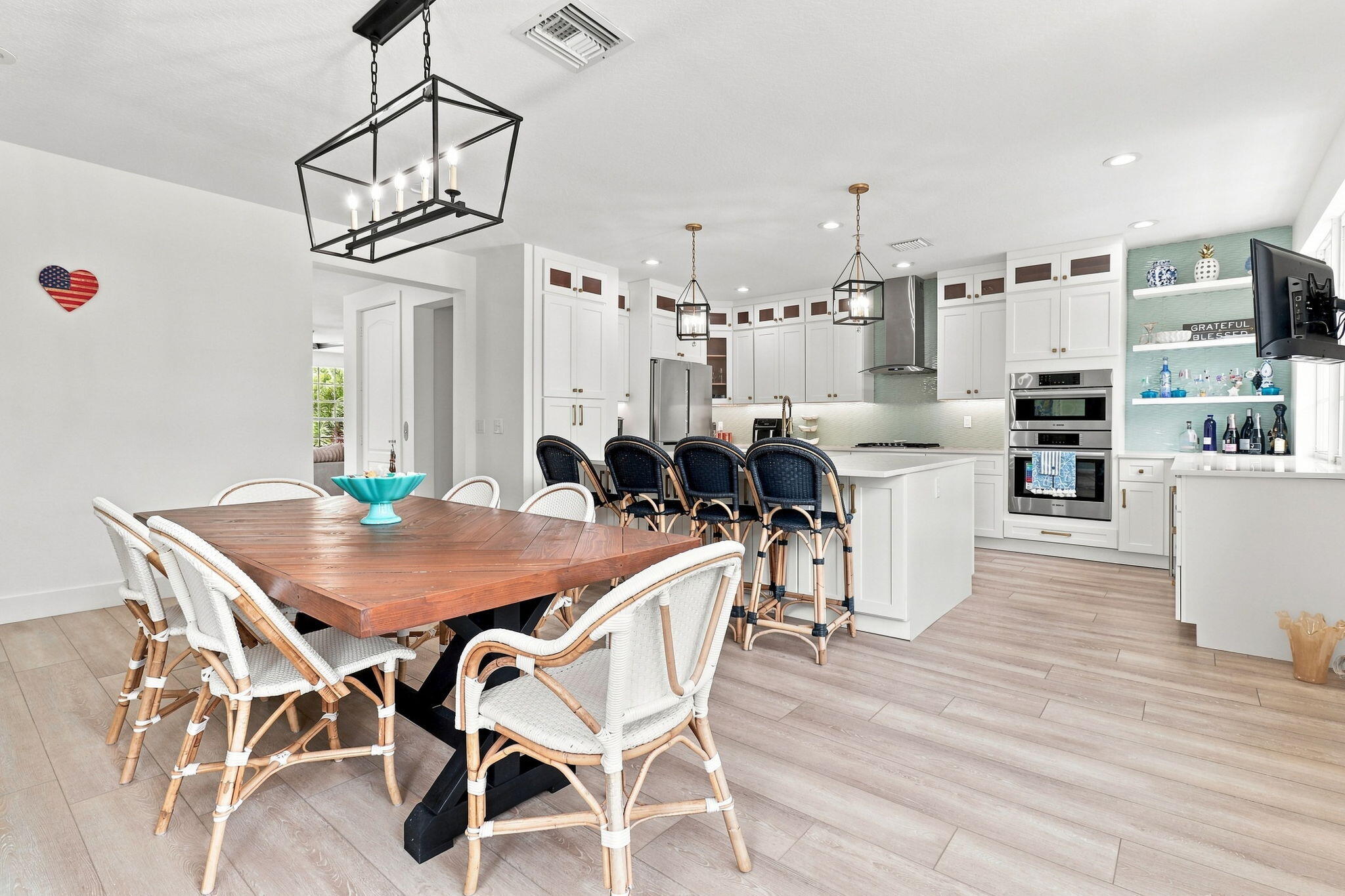 Open-concept living space with luxury vinyl flooring