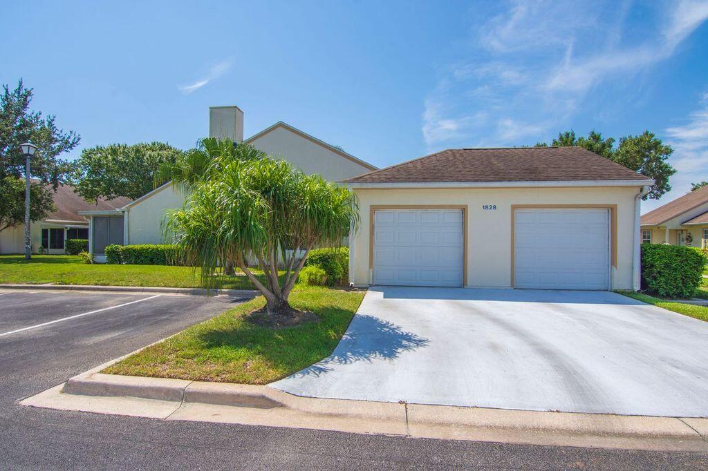 Attached Garage on the left, enters to kitchen