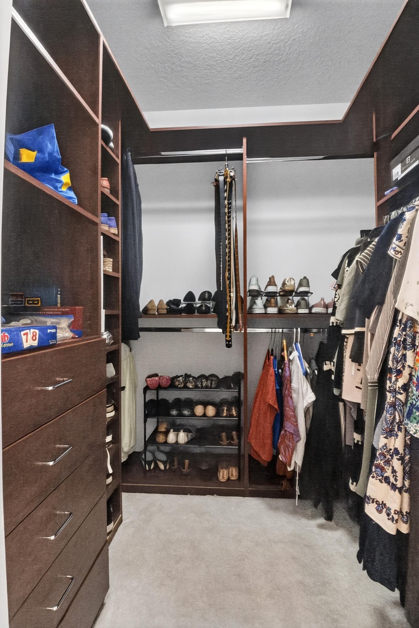 The organized closet keeps all your clothes beautifully organized & easily accessible.