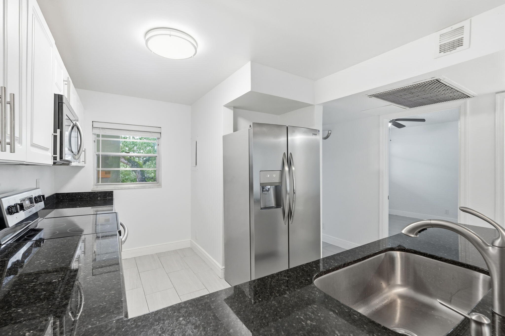 13-web-or-mls-9325_Lagoon_Pl_Unit_405_01