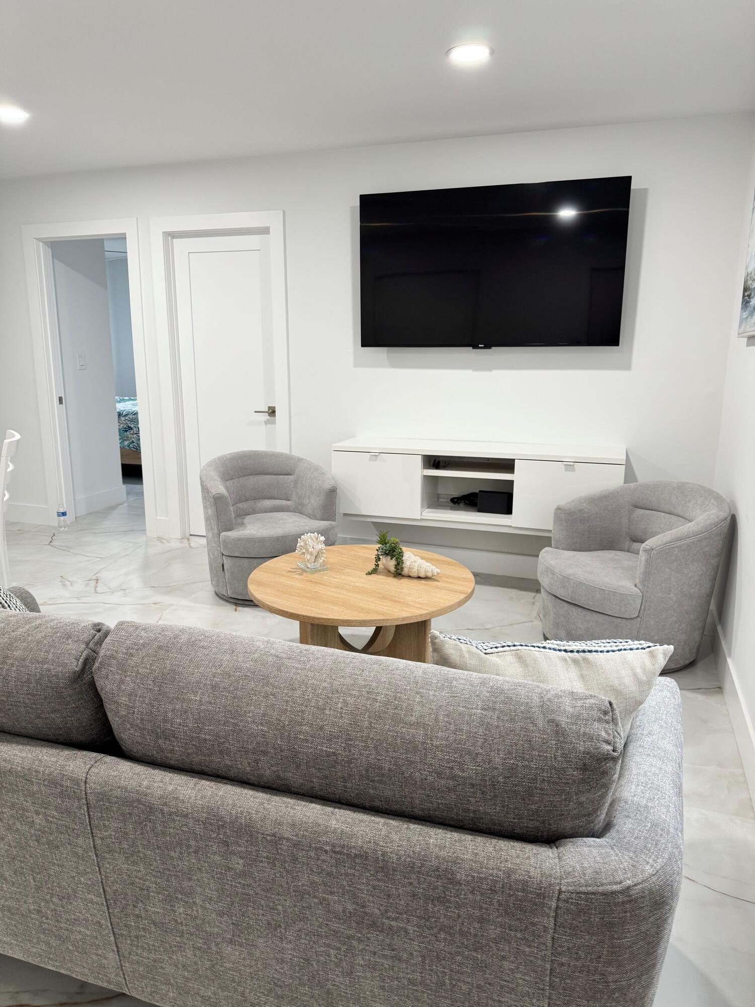 Bright and inviting interior featuring clean white finishes, modern trim, and a neutral color palette Bright and inviting interior featuring clean white finishes, modern trim, and a neutral color palette