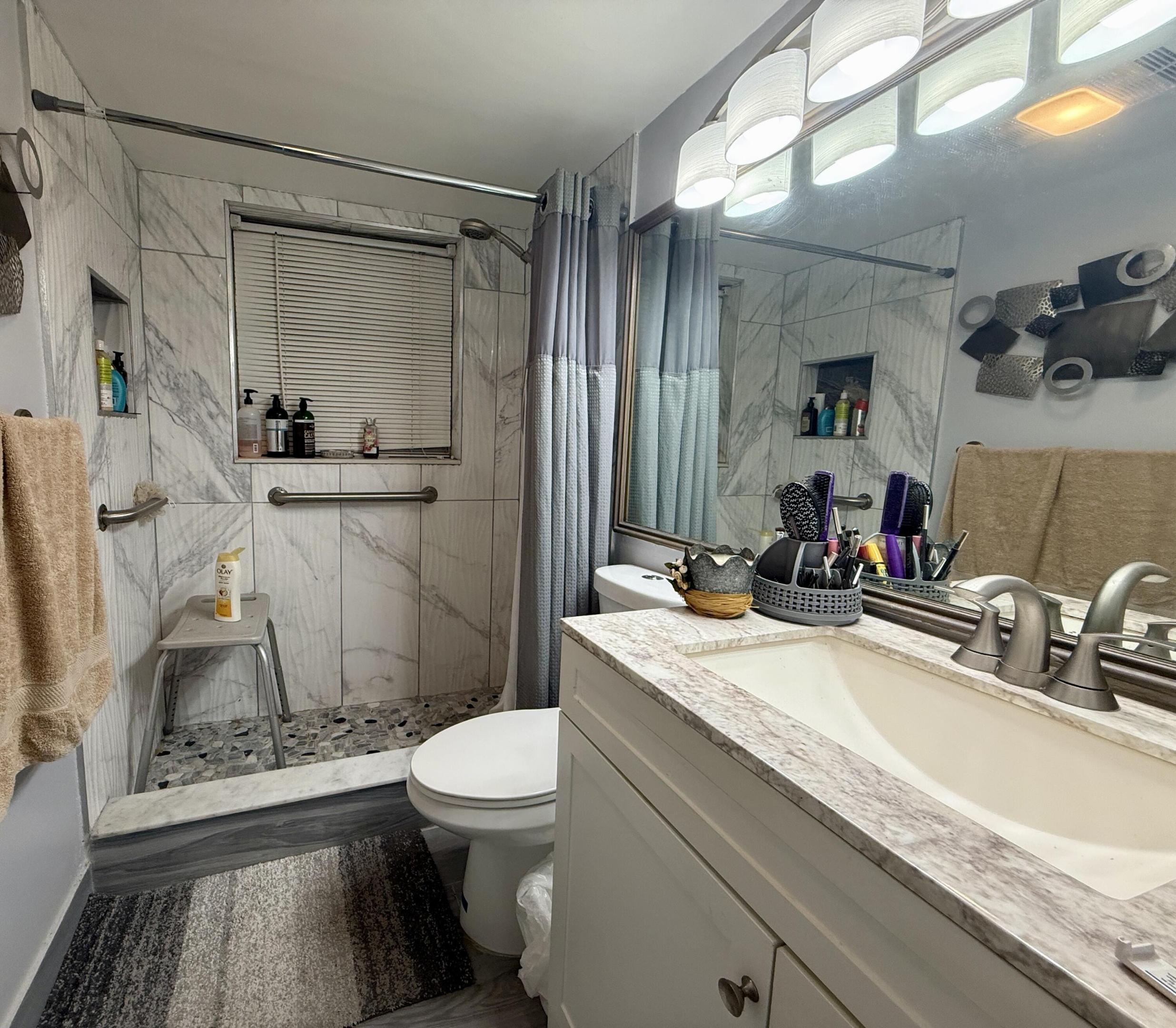 Updated Full Bath With Step-In Shower Updated Full Bath With Step-In Shower