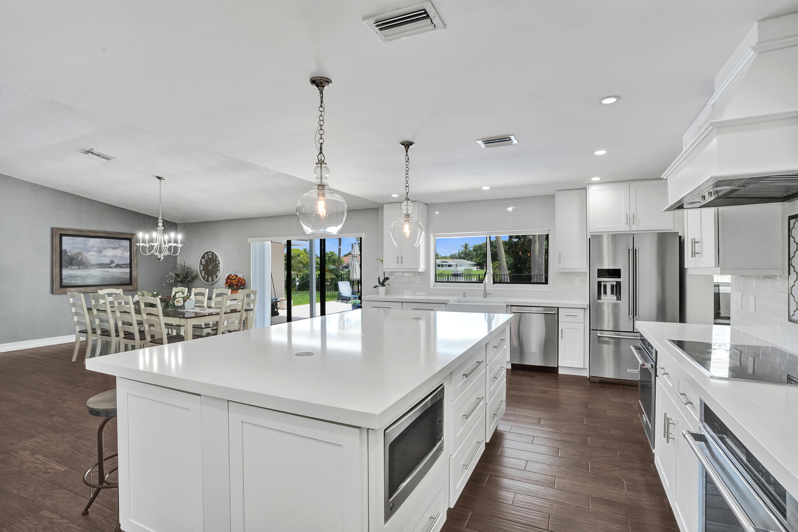View of the pool and lake from kitchen