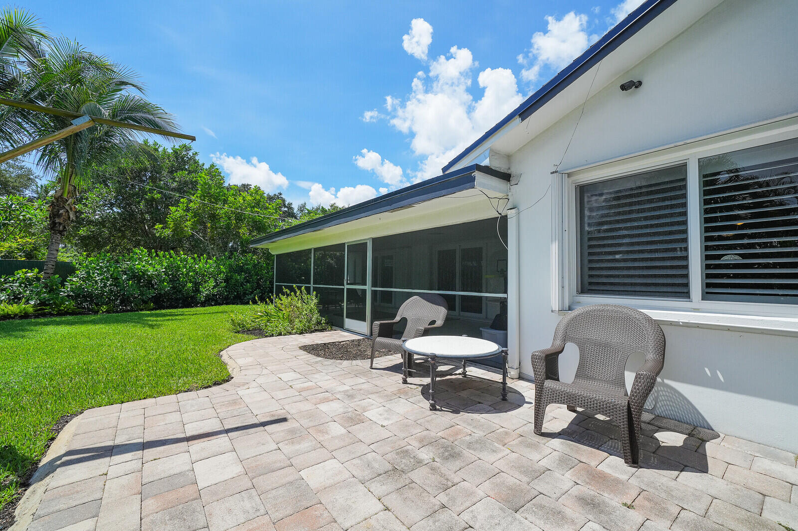 PARTIALLY PAVED BACKYARD SPACE