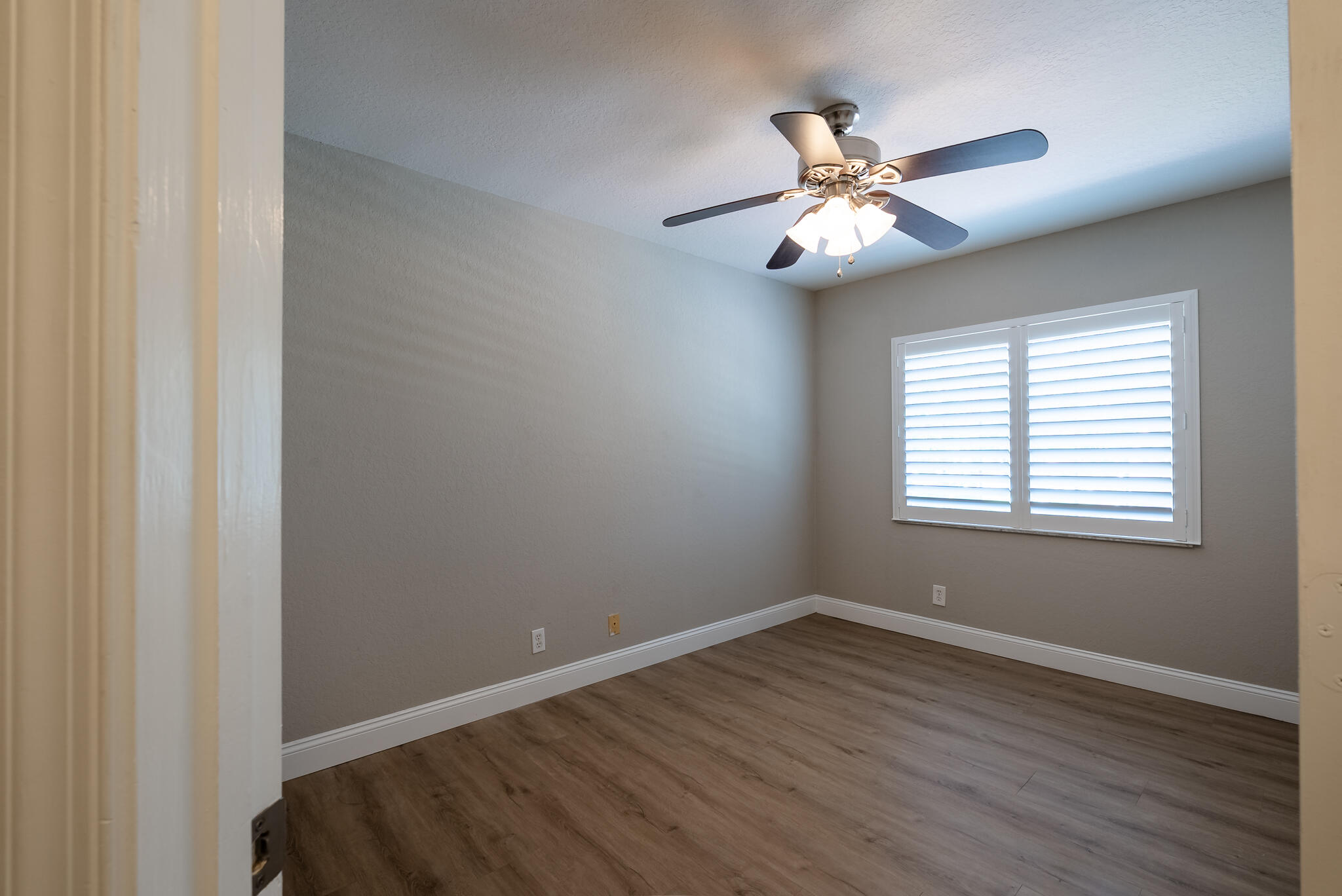 BEDROOM #2 WITH PLANTATION SHUTTERS