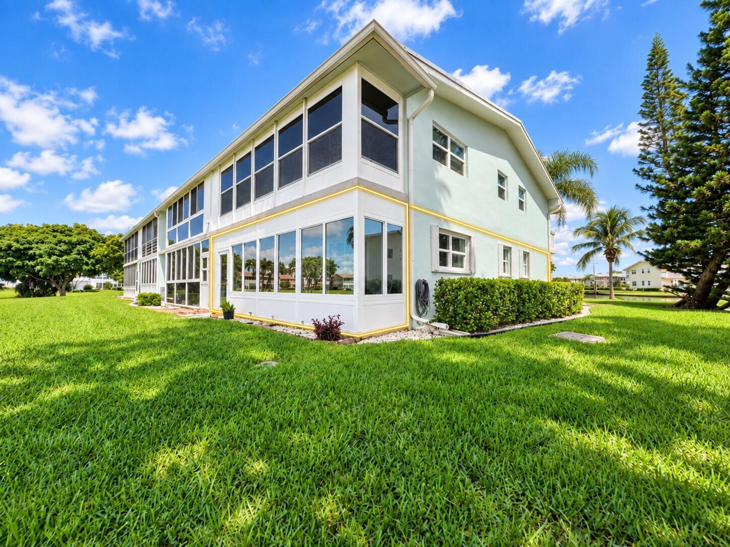 Ground Floor Corner 2/2 With Updated Impact Enclosed Lanai. Impact Windows Including the Sliders!